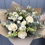 White flower bouquet in gift wrap called Ivory Florals