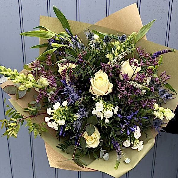 Ivory, white and blue bouquet of flowers